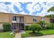 Exterior elevation of a condominium with a staircase at 200 Saint Andrews Blvd # 2607, Winter Park, FL 32792