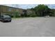 Convenient parking lot with well-maintained landscaping and easy access to the residences in this community at 200 Saint Andrews Blvd # 2607, Winter Park, FL 32792