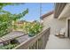 Private balcony with seating area and view of covered parking at 240 Killarney Bay Ct # 4, Winter Park, FL 32789