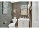 Stylish bathroom featuring modern fixtures, wood paneled walls, and elegant decor at 240 Killarney Bay Ct # 4, Winter Park, FL 32789