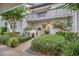 Charming home exterior featuring a quaint front entrance and a lovely balcony above the front door at 240 Killarney Bay Ct # 4, Winter Park, FL 32789