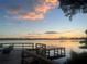 Enjoy tranquil lake views and colorful sunsets from the dockside seating area at 240 Killarney Bay Ct # 4, Winter Park, FL 32789