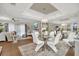 Beautifully decorated living space featuring a dining area, comfortable seating, and bright natural light at 240 Killarney Bay Ct # 4, Winter Park, FL 32789