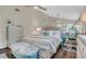 Comfortable bedroom with decorative details and a sitting area at 240 Killarney Bay Ct # 4, Winter Park, FL 32789