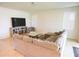 Comfortable living room with large sectional sofa and bright windows at 2612 Summer Clouds Way, Kissimmee, FL 34744