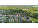 Aerial view of neighborhood, highlighting home, landscaping, street layout and general location at 2865 Ashton Ter, Oviedo, FL 32765