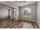 Spacious living room with wood floors and an open layout at 2865 Ashton Ter, Oviedo, FL 32765