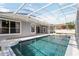Sparkling pool and screen enclosed patio offering an ideal outdoor experience at 2865 Ashton Ter, Oviedo, FL 32765