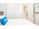 Bedroom with a wooden bed frame, and doorways to other rooms in the home at 3004 Latitude Ln, Kissimmee, FL 34747