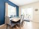 Elegant dining room with seating for six and lots of natural light at 3004 Latitude Ln, Kissimmee, FL 34747