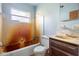 Bathroom featuring a vanity, toilet and tub/shower combo awaiting remodeling and personalization at 321 Beard Rd, Winter Garden, FL 34787