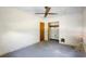 Spacious bedroom with ceiling fan and closet, ready for renovation and personalization at 321 Beard Rd, Winter Garden, FL 34787