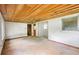 Living room with windows, wooden ceiling and sliding glass door, ready for renovation and natural light at 321 Beard Rd, Winter Garden, FL 34787