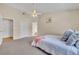Bright and airy bedroom with vaulted ceiling, ceiling fan and ample closet space at 335 Oakpark Loop, Davenport, FL 33837