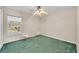 Clean bedroom featuring a ceiling fan and neutral colors at 335 Oakpark Loop, Davenport, FL 33837