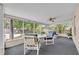 Enclosed lanai perfect for relaxing and enjoying views of the private backyard at 335 Oakpark Loop, Davenport, FL 33837