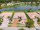 Aerial view of the house showcasing its tile roof and well-maintained landscaping at 3533 Somerset Cir, Kissimmee, FL 34746