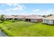 Spacious backyard with well-maintained lawn, ideal for recreation and outdoor activities at 3533 Somerset Cir, Kissimmee, FL 34746