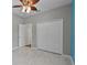 Well-lit bedroom with modern floors, closet and attached bathroom at 3533 Somerset Cir, Kissimmee, FL 34746
