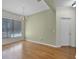 The dining room features wood floors and a chandelier at 3533 Somerset Cir, Kissimmee, FL 34746