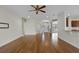 Spacious living room featuring hardwood floors, neutral walls and a ceiling fan at 3533 Somerset Cir, Kissimmee, FL 34746