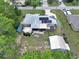Features of this property include solar panels, outdoor fire pit and spacious backyard with a unique Margaritaville themed shed at 37 Pecan Pass Trl, Ocala, FL 34472