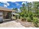 Backyard features a small koi pond, a screened in porch, and a shed at 37 Pecan Pass Trl, Ocala, FL 34472