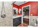 Bathroom showcasing a modern vanity, tiled shower, and access to the main bedroom at 37 Pecan Pass Trl, Ocala, FL 34472