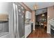 Modern kitchen with stainless steel appliances and stylish backsplash at 37 Pecan Pass Trl, Ocala, FL 34472