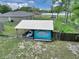 Features a quirky Margaritaville-themed shed/outbuilding, adding character and potential for a fun outdoor space at 37 Pecan Pass Trl, Ocala, FL 34472