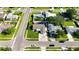 Bird's eye view of home, landscaped yard, and neighborhood streets with manicured lawns and mature trees at 4026 Seabridge Dr, Orlando, FL 32839