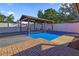 Backyard featuring outdoor covered seating area perfect for entertaining at 4026 Seabridge Dr, Orlando, FL 32839