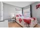 Bedroom featuring tile floor, one bed, and a window that offers natural light at 4026 Seabridge Dr, Orlando, FL 32839