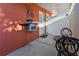 Covered patio area with outdoor seating and a decorative bicycle ornament at 4026 Seabridge Dr, Orlando, FL 32839