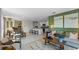 Spacious living area combining kitchen, dining, and living room with stylish decor and ample natural light at 4094 Giorgio Dr, Winter Haven, FL 33884