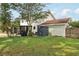 Relax in the backyard with a screened lanai and convenient storage shed at 4536 Misty Morn Cir, Orlando, FL 32812