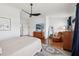Comfortable bedroom with wood floors and a ceiling fan at 4536 Misty Morn Cir, Orlando, FL 32812