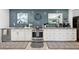 Modern kitchen with updated appliances, backsplash, countertop, and lots of storage at 4536 Misty Morn Cir, Orlando, FL 32812