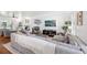 Comfortable living room with neutral tones, fireplace, and entertainment center at 4536 Misty Morn Cir, Orlando, FL 32812