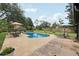 Beautiful backyard showcasing a large swimming pool and well-manicured landscaping at 4536 Misty Morn Cir, Orlando, FL 32812