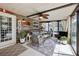 Inviting sunroom featuring comfortable seating, wood accents, and lots of natural light at 4536 Misty Morn Cir, Orlando, FL 32812