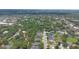 Scenic aerial shot of a residential area, highlighting the mix of homes and natural tree cover at 460 Suncrest Ct, Oviedo, FL 32765
