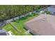 Aerial view of fenced backyard with lush lawn, shed, and view of the roof at 460 Suncrest Ct, Oviedo, FL 32765