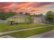 Beautiful single-story home with a well-kept lawn and lush landscaping at 460 Suncrest Ct, Oviedo, FL 32765