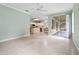 Open-concept living room and kitchen with plenty of natural light and space at 460 Suncrest Ct, Oviedo, FL 32765
