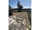 Lush backyard featuring a pond, perfect for enjoying the outdoors at 5265 Broken Arrow Dr, Kissimmee, FL 34746