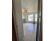 This bedroom features tile floors, a ceiling fan, and a bright window at 5265 Broken Arrow Dr, Kissimmee, FL 34746