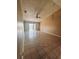 Bright living room with tile flooring, a ceiling fan, and sliding doors to the outside at 5265 Broken Arrow Dr, Kissimmee, FL 34746