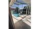 Screened pool with an attached spa, perfect for relaxation and entertainment at 5265 Broken Arrow Dr, Kissimmee, FL 34746