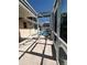 Sparkling pool with screened enclosure, offering a private outdoor oasis at 5265 Broken Arrow Dr, Kissimmee, FL 34746